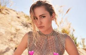 Miley Cyrus explains what being an eccentric individual in a 'hetero relationship' resembles