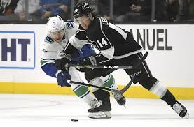 Canucks rally to beat Kings 4-3, end road failing streak at 4